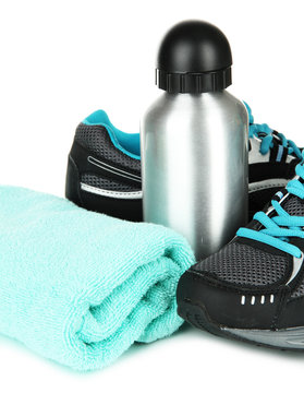 Sports Bottle,sneakers And Towel Isolated On White