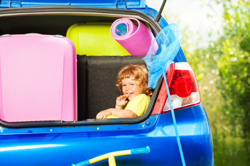 Child ready for car trip