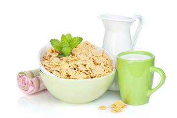 Fresh corn flakes with milk. Isolated on white background