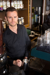 Young Barista Working At Coffeeshop