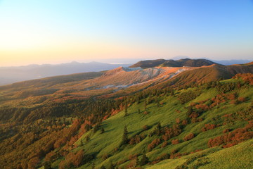 Mt. Kusatsu-Shirane glows in the morning sun, Japan