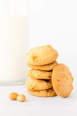 macadamia and white chocolate cookies and a glass of milk