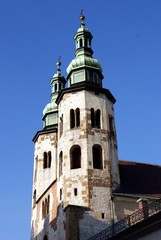 Fototapeta na wymiar Towers of old romanesque styled church in Krakow