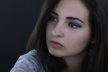 Naklejka premium Portrait of beautiful woman isolated on black