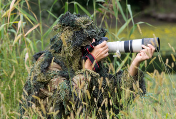 Photographer in ghillie suit in action © Budimir Jevtic