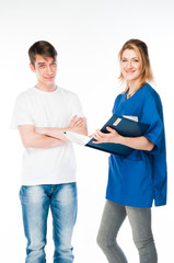 patient at a reception at the doctor in blue uniform