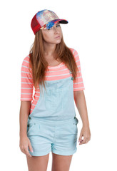 Fototapeta premium Red-haired teen girl in shorts.