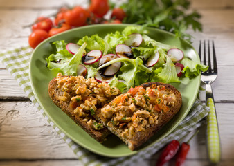 slice bread with chicken and mixed salad, selective focus