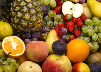 Naklejka na ściany i meble fruit background of fresh exotic fruits