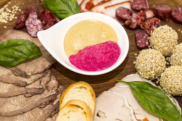 plate of sausages and bacon sauce on a table in a restaurant