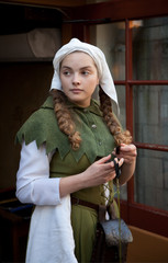 Medieval style girl at the street of  tallinn