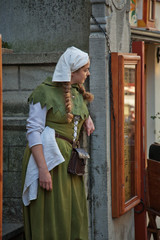 Medieval style girl at the street of  tallinn