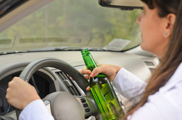 Female driver drinking and driving