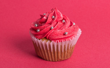Cupcake on red background
