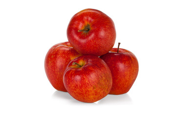 Four red apples isolated on white background