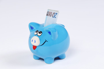 blaues Sparschwein mit 20 Euro Schein