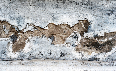 wall with a huge crack on plaster