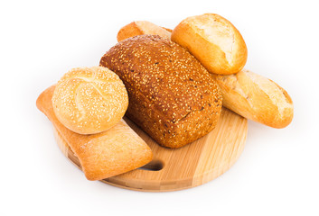 assortment of baked bread isolated on white background