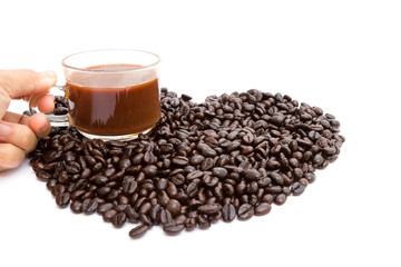 Coffee cup and beans isolated on a white background