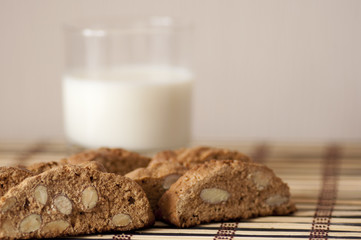 Delicious cantuccini cookies and cup of milk