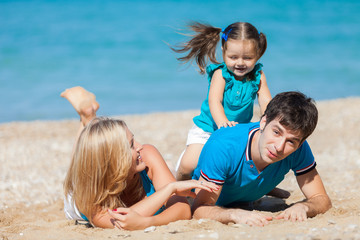 Fototapeta na wymiar Family on beach vacation