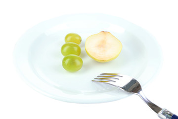 Small portion of food on big plate isolated on white