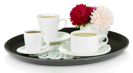 Cups of coffee on tray isolated on white