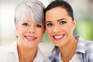 middle aged mother and young daughter