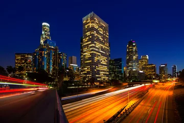 Fotobehang Downtown LA nacht Los Angeles zonsondergang skyline Californië © lunamarina