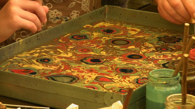 Art students practicing ebru
