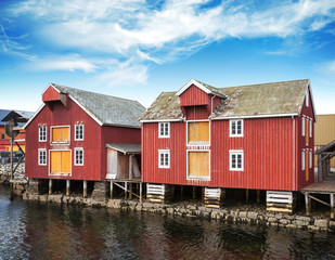 Red wooden houses in small Norwegian fishing village