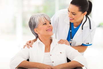 caring doctor with senior patient