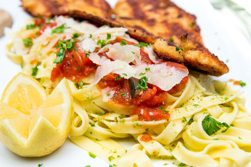 pasta and chicken with lettuce