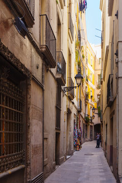 narrow street of Gothic district.  Barcelona