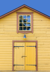Wooden Yellow Hut's Facade