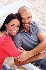Fototapeta premium Happy smiling middle-aged couple looking at something outdoors