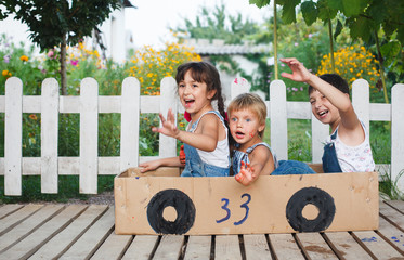 children play in the car