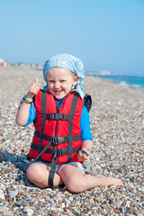 Dziecko na plaży sporty wodne