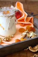 yogurt in a jar of nuts and apricots