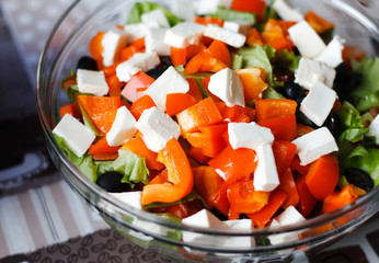 Greek salad in a glass bowl
