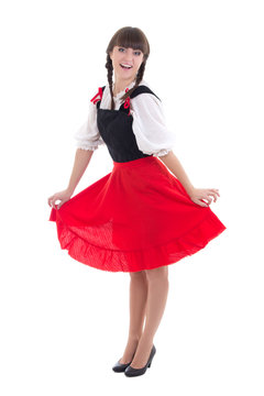 happy woman in typical bavarian dress dirndl