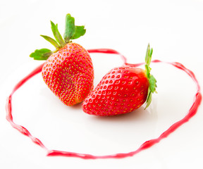 Fresh strawberries  as romantic dessert  on a plate in heart sha