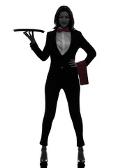 Obraz premium woman waiter butler holding empty tray silhouette
