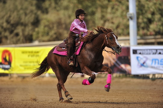Girl is riding a horse