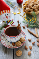 Fototapeta na wymiar Christmas almond cookies and a cup of hot chocolate