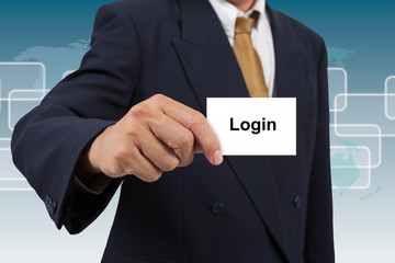 Businessman show a white card with word Login