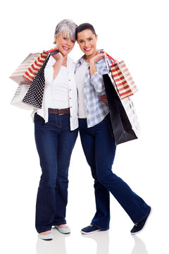 Senior Mother And Daughter Holding Shopping Bags