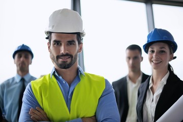 business people and engineers on meeting