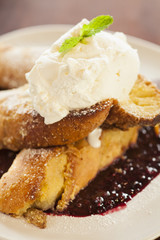 vanilla-dipped French toast, whipped cream and syrup