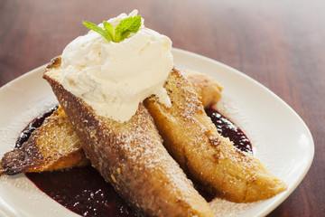vanilla-dipped French toast, whipped cream and syrup